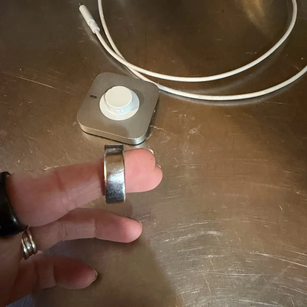 Oura size 9 silver ring ad Charging Dock